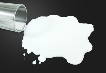 Milk spilled from glass