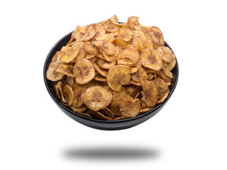 Sweet bananas chip in black bowl isolated on white background. S