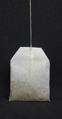  isolated tea bag on the gray background