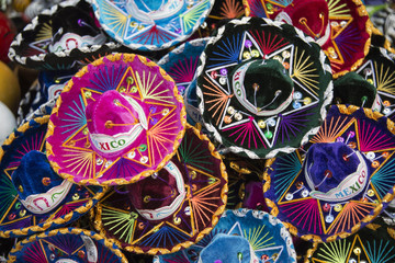 Colorful Mexican sombrero hats at an outdoor market in Mexico