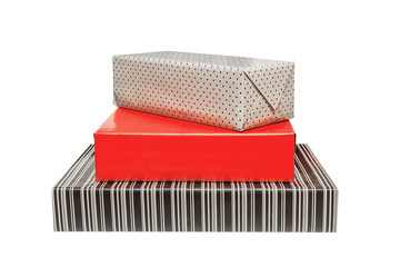 Boxes, gift stand one on another. Packaging in peas and red. Isolated on white.