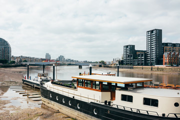 River Thames in London with Boat Docked