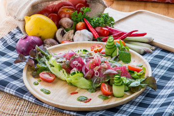 Fresh Salmon Salad with vegetables,healthy salad with mixed lett