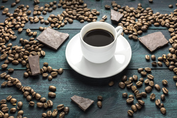 Coffee cup photo with grains and chocolate