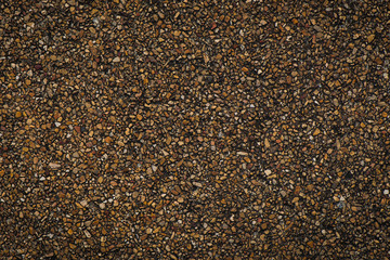Dark and Brown gravel wall background and textured