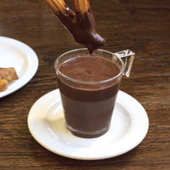 Photo of churros con chocolate, traditional Spanish dessert