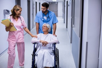 doctor interacting with female senior patient