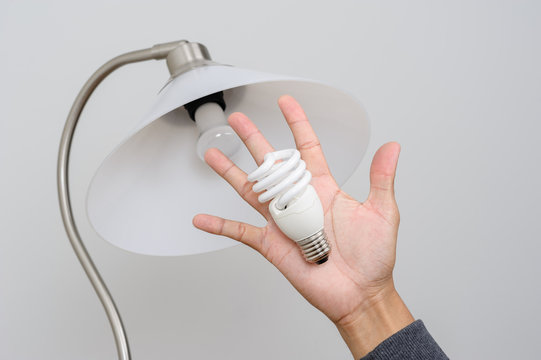 changing light bulb