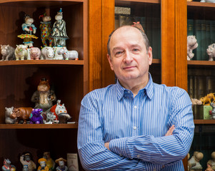 the collector and his hippos in a private collection