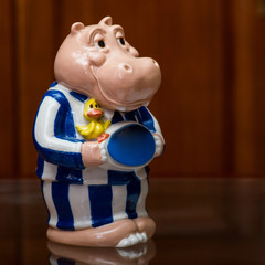 the collector and his hippos in a private collection