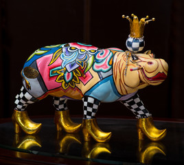 the collector and his hippos in a private collection