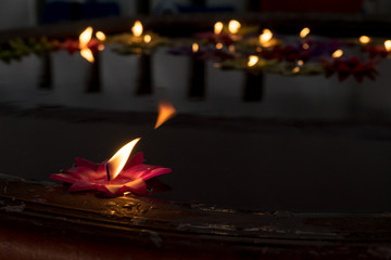 Candles floating in the water 