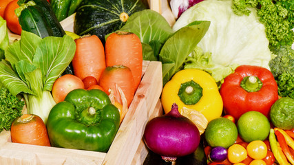 Various fresh vegetables in wooden container