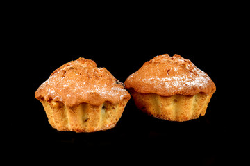 Chocolate biscuit cake closeup on a black background