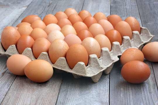 fresh chicken brown eggs in packing