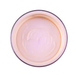 jar with a female face cream on white background