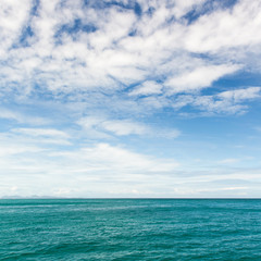 Naklejka na ściany i meble blue sky with cloud over the sea background,