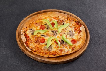 Delicious italian pizza served on pizza tray