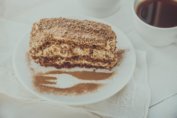 Chocolate cake and cup of coffee