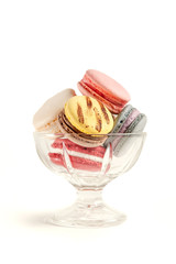 A cup of macaroons isolated on white background 