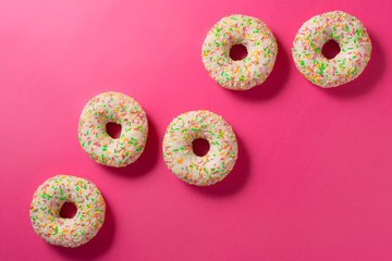 donuts on pink background