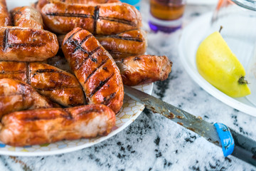 Sausage on the grill in the plate