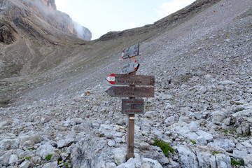 Via ferrata Alpinisteig sign in Sexten Dolomites mountains in South Tyrol, Italy