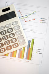 Obraz premium Business concept,Calculator on chart paper.