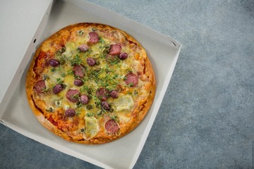 Italian pizza in a opened box