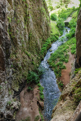 Aerial view of the creek flowing out of the cave