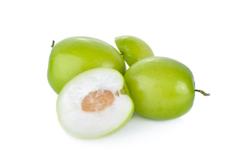 whole and half cut fresh jujube on white background