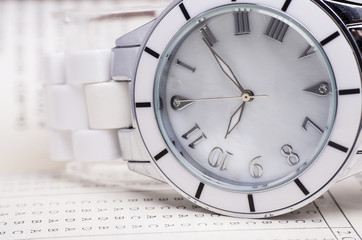 Luxury Wrist Watch Closeup On Paper 