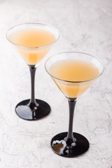 Two glasses with a cocktail martini