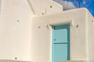 Traditional white houses at the narrow streets of Mykonos, Cycla