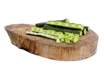 moringa isolated on wooden on white background