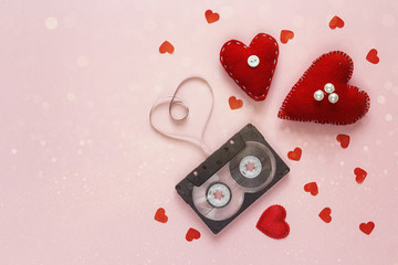 Valentine's Day background with audio cassette tape in the shape