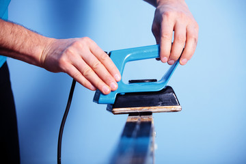 Processing the sliding surface of skis by special iron
