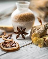 still life of fresh ginger with a wooden spoon  sugar