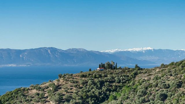 Little House on a Hill with Stunning Views of the Mountains and the Lake