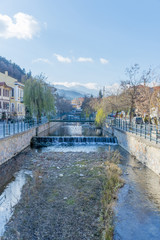 Fototapeta premium The picturesque centre of Florina, Greece. River crossing across