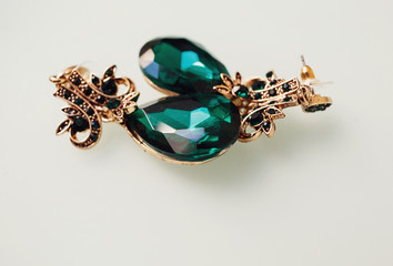 The brooch stands on the table