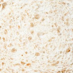Fresh, healthy slice of bread close - food background