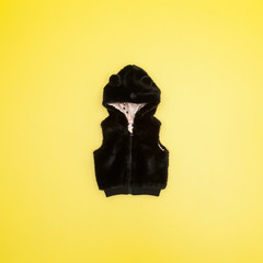 Womens vest on yellow background