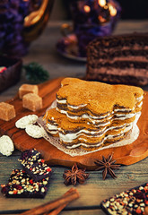 honey cake with chocolate nuts tea lying on the table