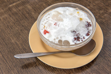 Fototapeta na wymiar Thailand dessert known as bubur cha cha, bobochacha, or momochac