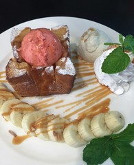 honey toast with strawberry ice cream and banana