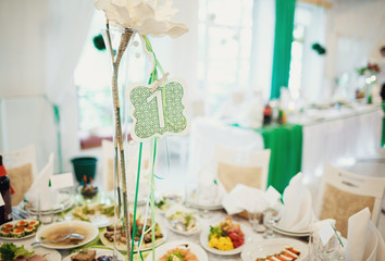 Wedding decorations on the tables of guests