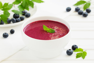 Desert- blueberry soup with cream.