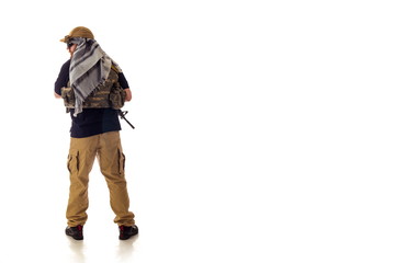 man in military outfit of the CIA, which is similar to the clothing of a warrior Mujahedin, in...
