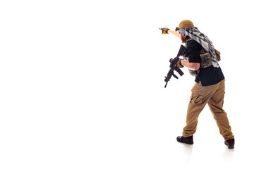 man in military outfit of the CIA, which is similar to the clothing of a warrior Mujahedin, in...